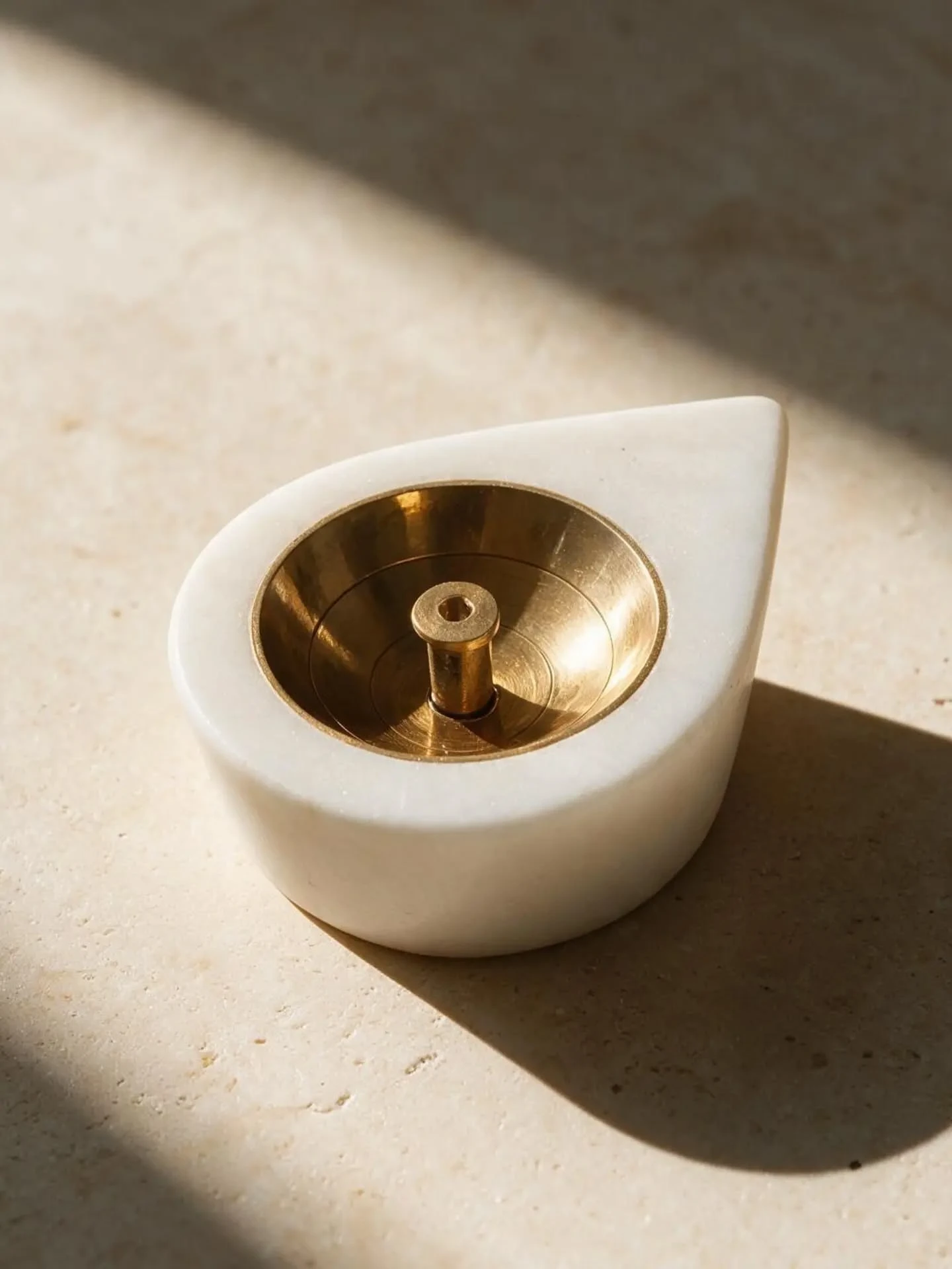 white-marble-brass-diya